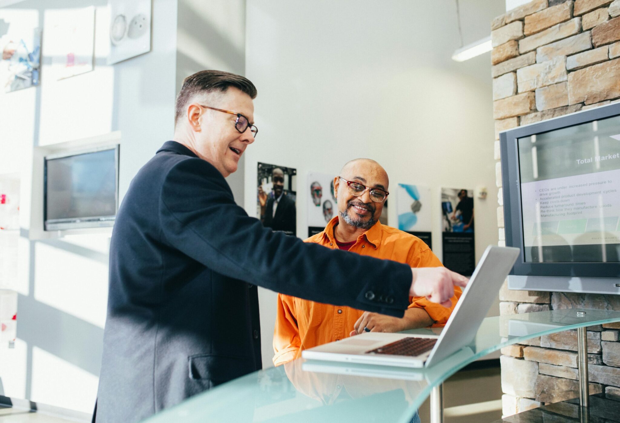 Man Discussing Reports with the Client
